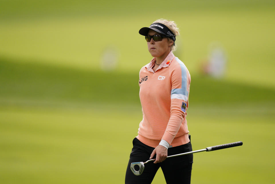 Brooke M. Henderson, of Canada, walks to the 18th green during the third round at the KPMG Women's PGA Championship golf tournament at the Aronimink Golf Club, Saturday, Oct. 10, 2020, in Newtown Square, Pa. (AP Photo/Chris Szagola)