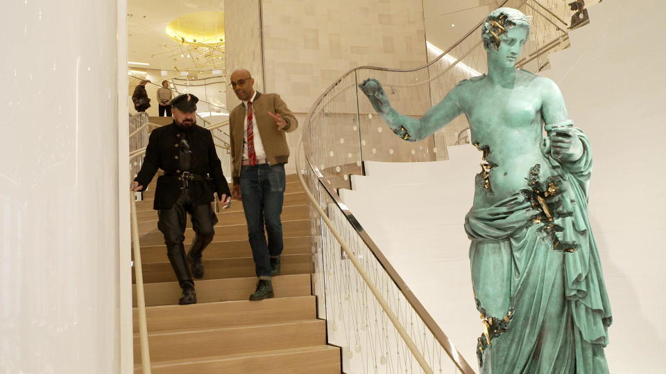 Architect Peter Marino with correspondent Kelefa Sanneh at Tiffany's flagship, dubbed The Landmark. Daniel Arsham's 12-foot tall bronze sculpture is titled, 