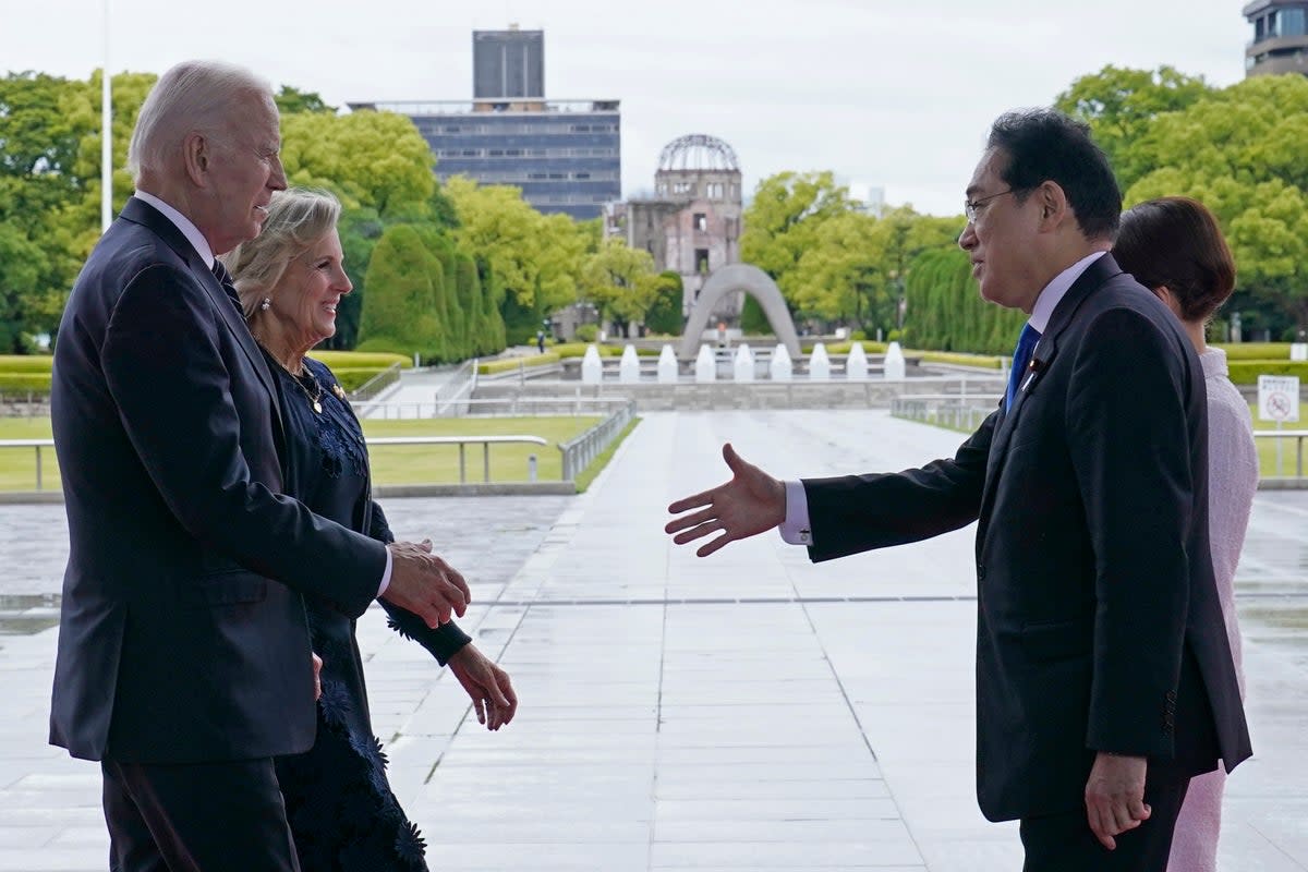 Joe Biden and Jill Biden welcomed by Japan’s Fumio Kishida and his wife Yuko Kishida at the Hiroshima Peace Memorial Park ahead of G7 meeting (AP)