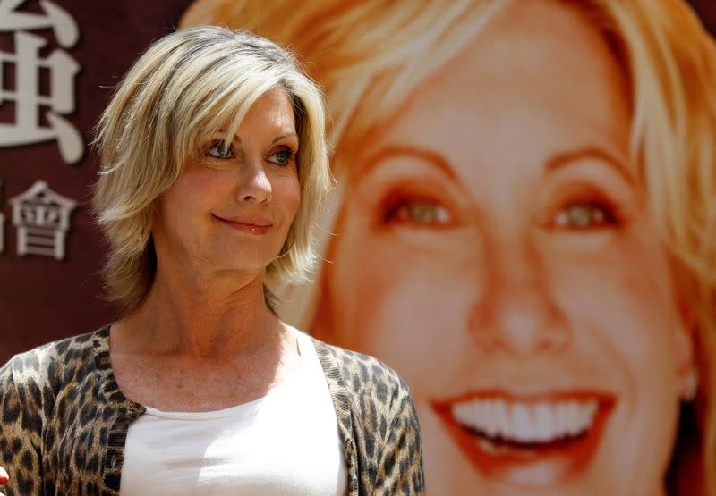 FILE PHOTO: Australian singer Olivia Newton-John holds a news conference in Taipei