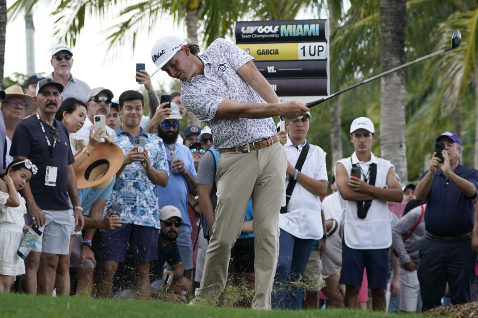 Cameron Smith hits from the rough off the 18th fairway during the second round of the LIV Golf Team Championship at Trump National Doral Golf Club, Saturday, Oct. 29, 2022, in Doral, Fla. (AP Photo/Lynne Sladky)