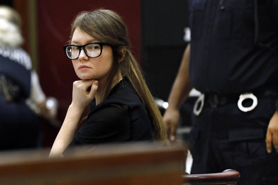 FILE - In this April 25, 2019 file photo, Anna Sorokin, who claimed to be a German heiress, sits at the defense table during jury deliberations in her trial at New York State Supreme Court, in New York. Sorokin, who is currently under house arrest in New York, has a new podcast, “The Anna Delvey Show.” (AP Photo/Richard Drew, File)