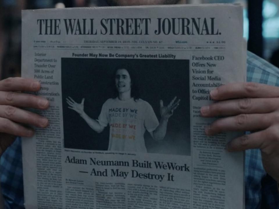 an image of a fictional wall street journal story about adam neumann, modeled off of a real one that was published in 2019. it shows jared leto as adam neumann, hodling his arms out