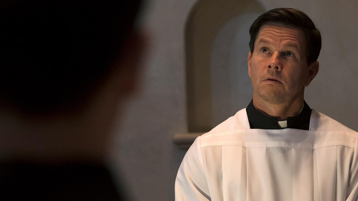  Mark Wahlberg dressed in his priests robes in Father Stu. 