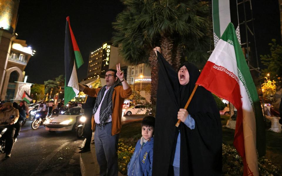 People celebrate in Iran