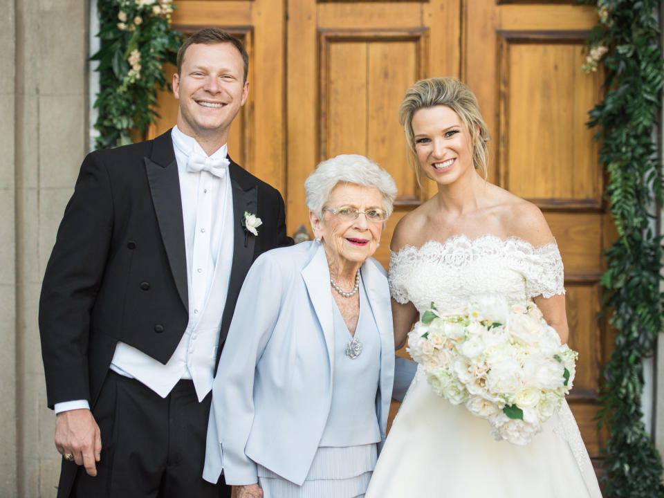 Altman flanked by the bride and her brother, Neil Wilson. 