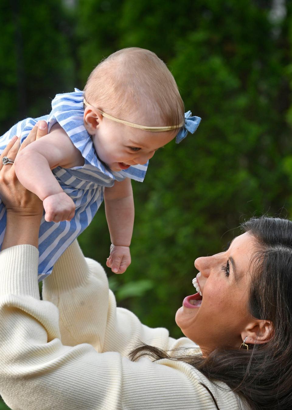 Nikki Burdine plays with her baby, Andi, last month. When Burdine gave birth almost a year ago, Andi was 1.4 pounds and there was a chance she could die, especially after she got a blood infection. Burdine posted her story on social media anyway, and received an outpouring of support.