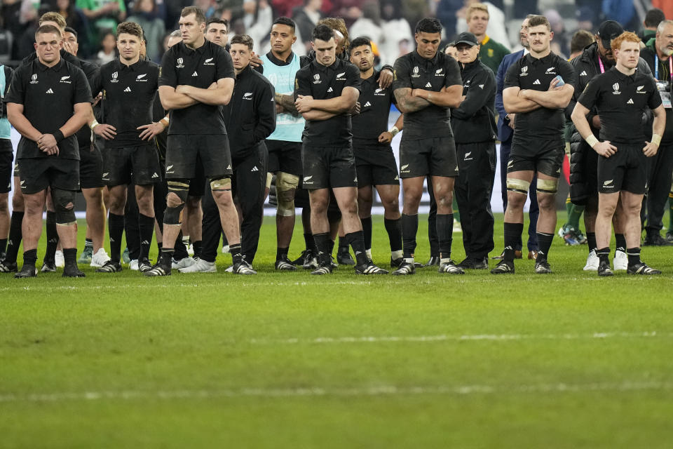 New Zealand players react after the Rugby World Cup final match between New Zealand and South Africa at the Stade de France in Saint-Denis, near Paris, Saturday, Oct. 28, 2023. South Africa won 12-11. (AP Photo/Pavel Golovkin)