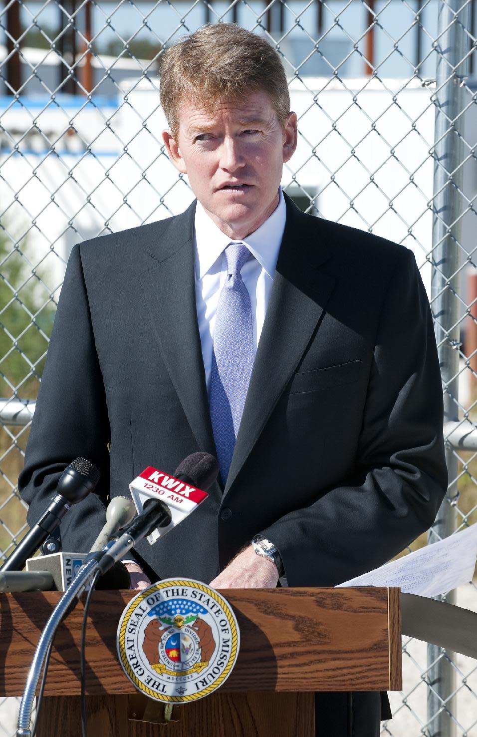 Missouri Attorney General Chris Koster announces felony charges against former Mamtek U.S. CEO Bruce Cole outside the failed business in Moberly, Mo.,Tuesday, Sept. 18, 2012. Cole was arrested at his California home Tuesday morning. (AP Photo/Columbia Daily Tribune, Kit Doyle)