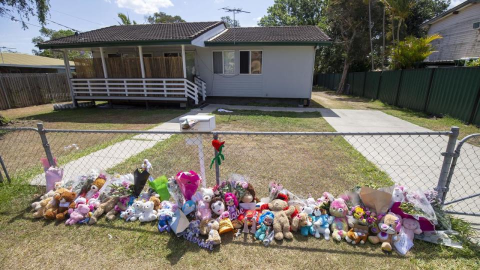 Tributes outside the home where the girls died (file image)