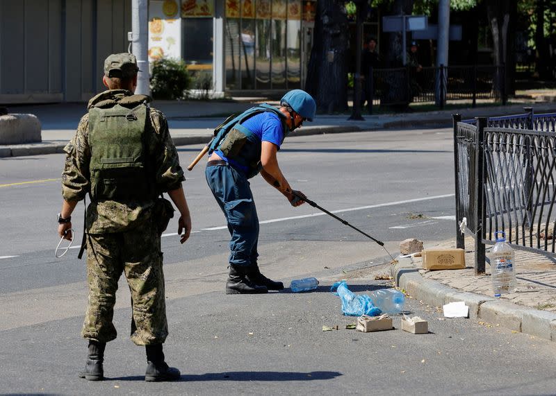 FILE PHOTO: Combat engineers of pro-Russian troops demine explosives in Donetsk