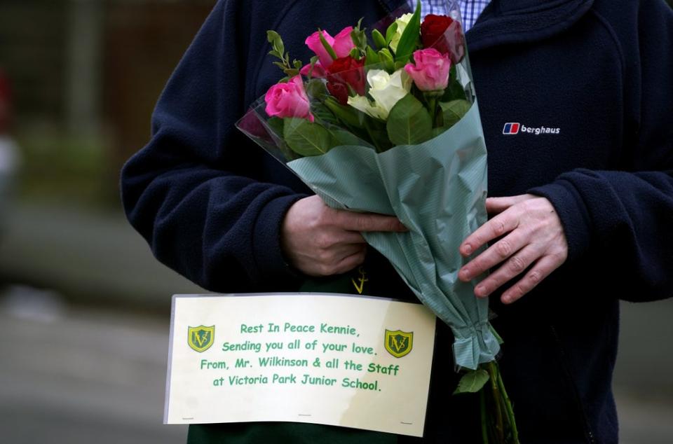 Flowers were left at the scene (Peter Byrne/PA) (PA Wire)