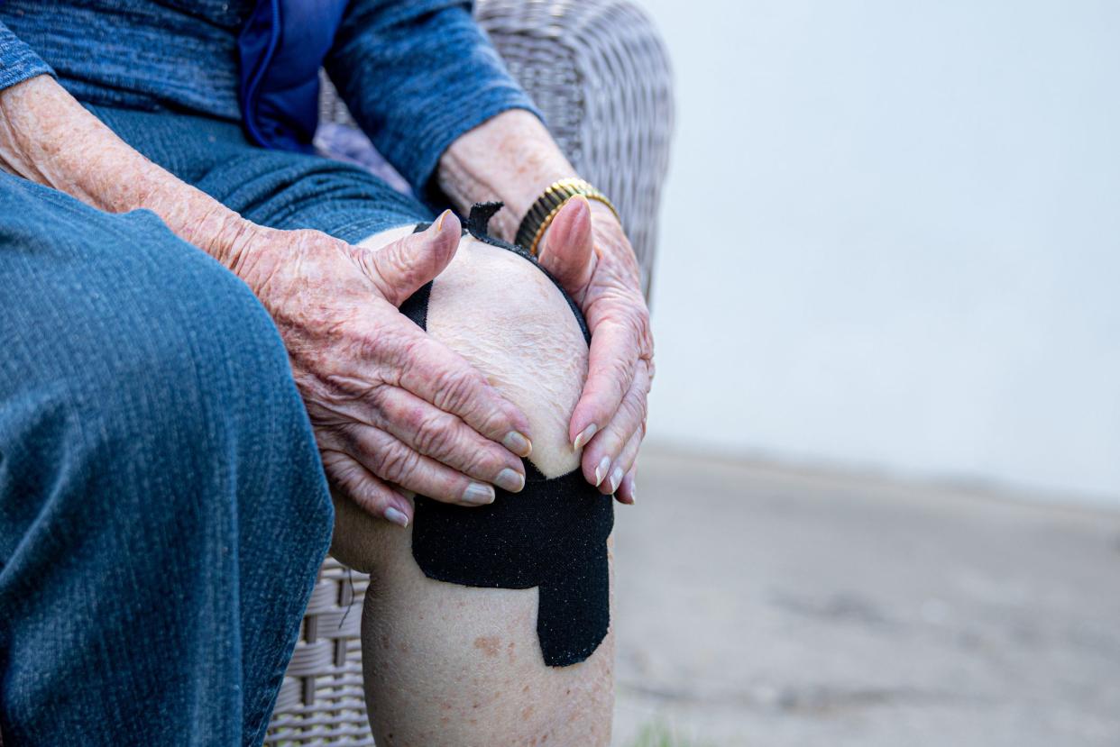 Senior Caucasian Woman's Knee Joint brace for arthritis