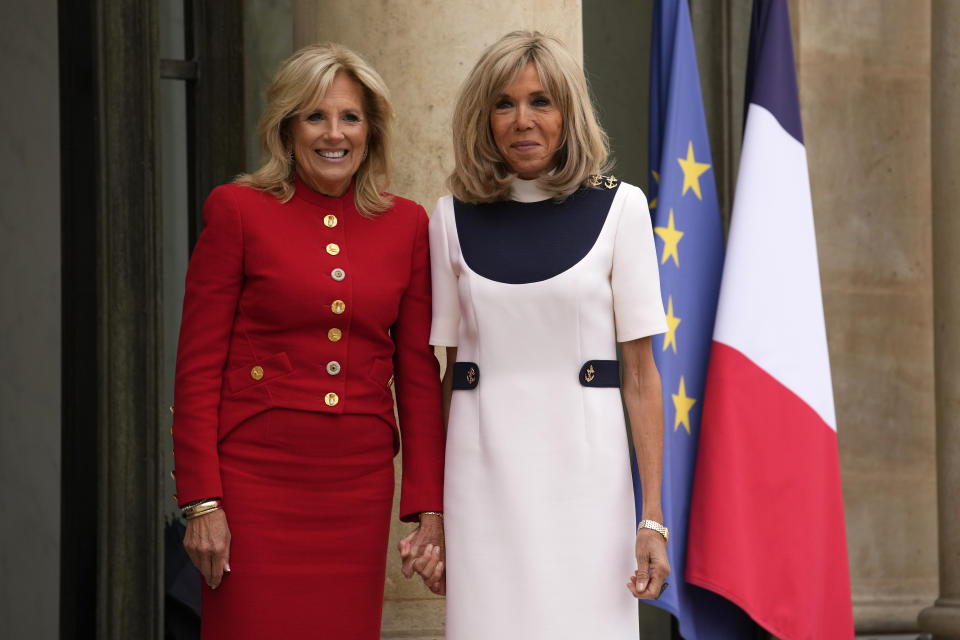 First lady Jill Biden, left, and French President Emmanuel Macron's wife Brigitte Macron pose before their meeting Tuesday, July 25, 2023 at the Elysee in Paris. United States First Lady Jill Biden is in Paris to attend a flag-raising ceremony at UNESCO, marking the United States' official reentry into the United Nations' educational, scientific and cultural organization after a five-year hiatus. (AP Photo/Christophe Ena)