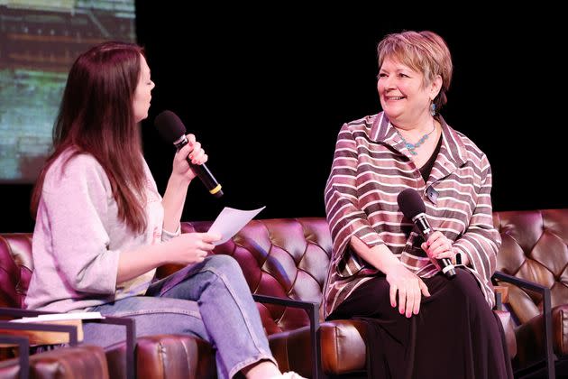 Protasiewicz (right) speaks during a live taping of the liberal podcast, 