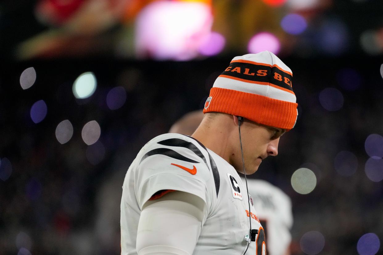 Injured Cincinnati Bengals quarterback Joe Burrow (9) paces the sideline in the fourth quarter of the NFL Week 11 game between the Baltimore Ravens and the Cincinnati Bengals at M&T Bank Stadium in Baltimore on Thursday, Nov. 16, 2023. The Bengals fell to the Ravens, 34-20.