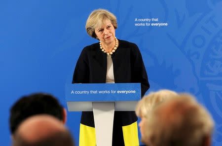 Prime Minister Theresa May delivers a speech at the British Academy in London, where she said that a new wave of grammar schools will end "selection by house price" and give every child the chance to go to a good school, in Britain September 9, 2016. REUTERS/Nick Ansell/Pool