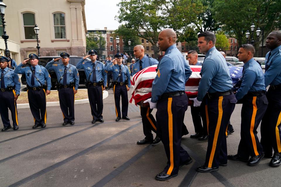 Aug 10, 2023; Trenton, NJ, USA; New Jersey State Police carry the flag-draped casket of Lt. Gov. Sheila Oliver into the New Jersey State House on Thursday, Aug. 10, 2023, in Trenton. Mandatory Credit: Danielle Parhizkaran/NorthJersey.com