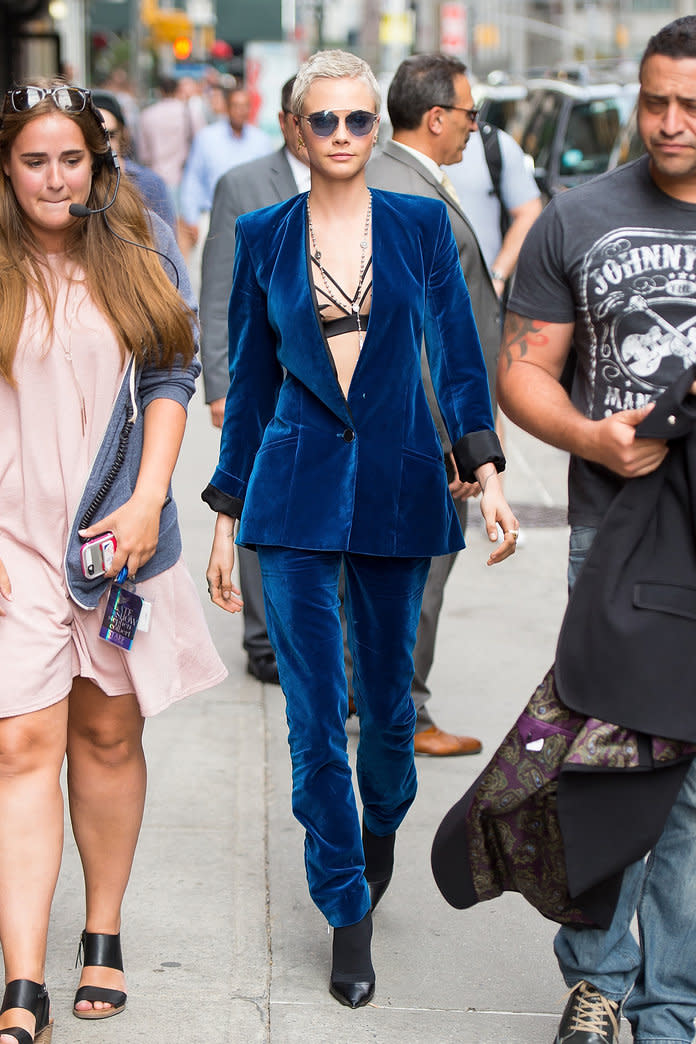 Cara Delevingne defied the summery N.Y.C. temperatures in a velvet suit.