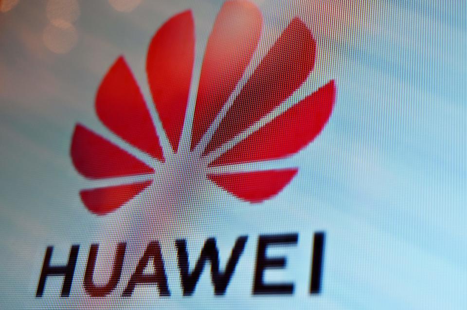 A Huawei logo is seen on a screen during the Mobile World Congress (MWC 2019) introducing next-generation technology at the Shanghai New International Expo Centre (SNIEC) in Shanghai on June 26, 2019. (Photo by Hector RETAMAL / AFP)        (Photo credit should read HECTOR RETAMAL/AFP/Getty Images)