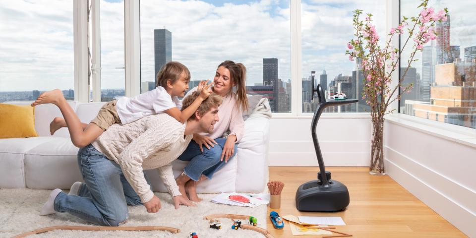 A family video chats using a robot.