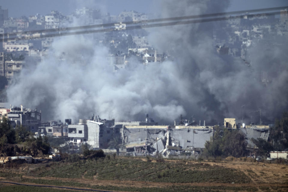 Smoke rises from an explosion following an Israeli strike in the Gaza Strip, as seen from southern Israel, Thursday, Nov. 9, 2023. (AP Photo/Victor R. Caivano)