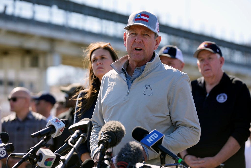 Georgia Gov. Brian Kemp speaks at a news conference about border policies, in Shelby Park in Eagle Pass, Texas, Sunday, Feb. 4, 2024. (Jay Janner/Austin American-Statesman via AP)