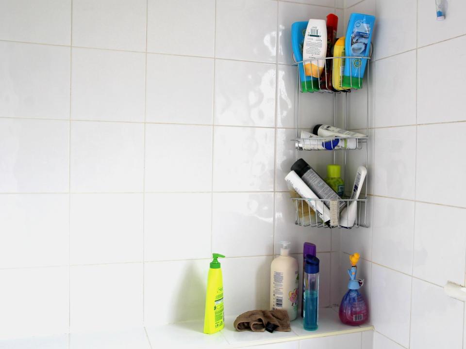 Shampoo and shower gel products in a bathroom