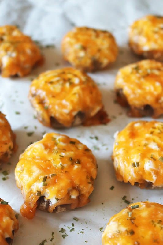 <p>Simply Happenings</p><p>Easy air fryer stuffed mushrooms filled with cream cheese, sour cream and garlic, and topped with cheddar and chives. They’re great as an appetizer or a side dish!</p><p><strong>Get the recipe: <a href="https://www.simplyhappenings.com/air-fryer-stuffed-mushrooms/" rel="nofollow noopener" target="_blank" data-ylk="slk:Air Fryer Stuffed Mushrooms;elm:context_link;itc:0;sec:content-canvas" class="link ">Air Fryer Stuffed Mushrooms</a></strong></p>