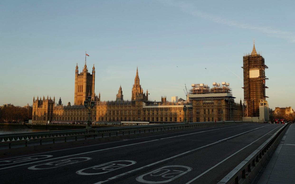 An almost empty Westminster Bridge on the first day of Britain's first lockdown to try to fight the spread of coronavirus, in London  - Matt Dunham 