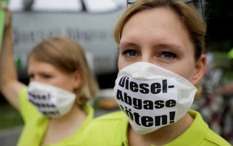 Campaigners in Germany protest about diesel in the wake of the VW scandal - Credit: DPA