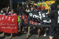 Anti-coup protesters from various township hold slogans during a demonstration in Yangon, Myanmar on Tuesday May 11, 2021. The military takeover of Myanmar early in the morning of Feb. 1 reversed the country's slow climb toward democracy after five decades of army rule. But Myanmar's citizens were not shy about demanding their democracy be restored. (AP Photo)