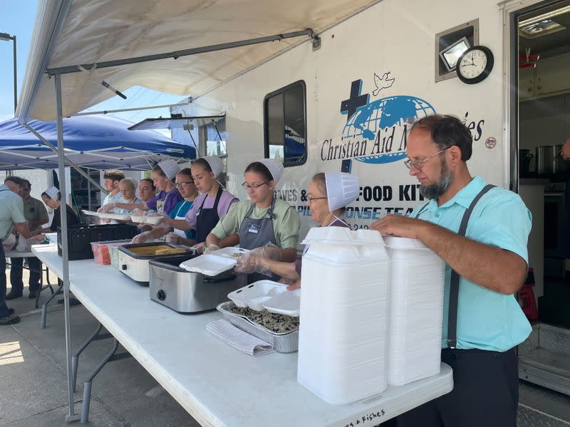 Members of Christian Aid Ministries who have come in from out of state prepare meals for those impacted by Hurricane Ida, in Houma, Louisiana