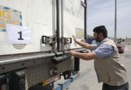 First shipment of COVID-19 vaccines arrives at Bab al-Hawa crossing at Syrian-Turkish border, in Idlib governorate