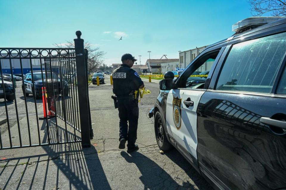 Sacramento Police arrive on the scene where a student was shot in the arm at Grant Union High School on Tuesday.