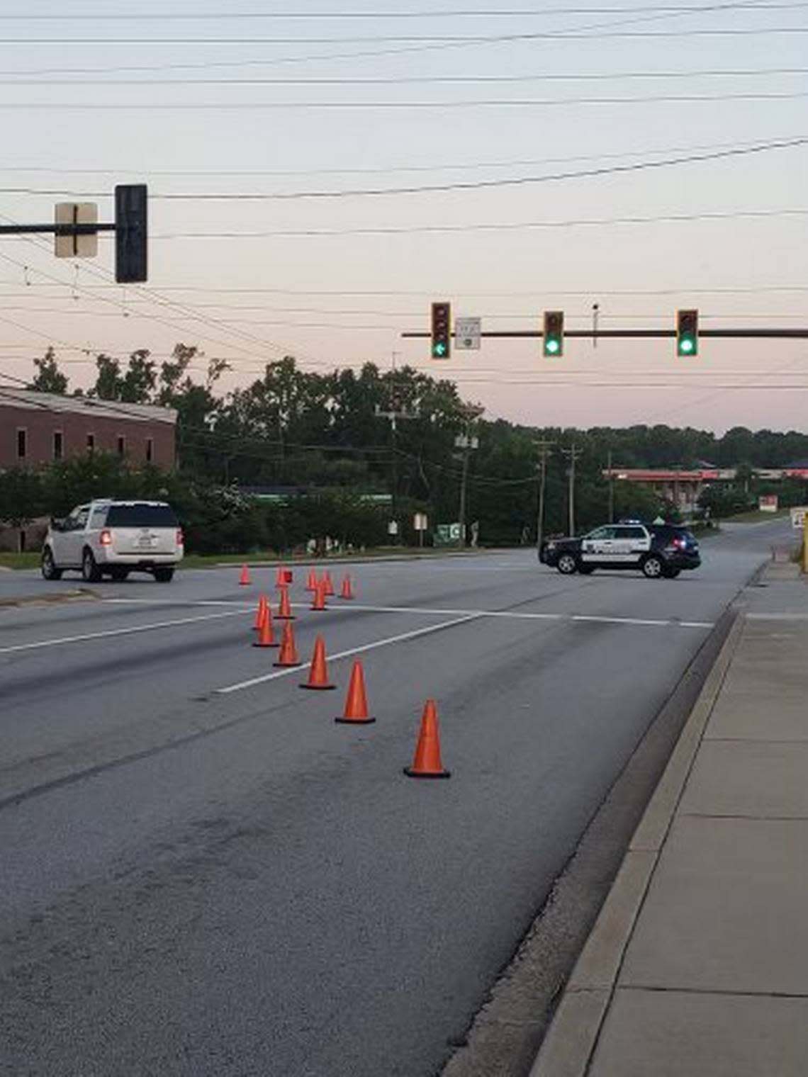 A busy intersection was blocked following a crash, police said.