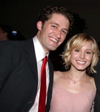 Matthew and Kristen standing together and smiling