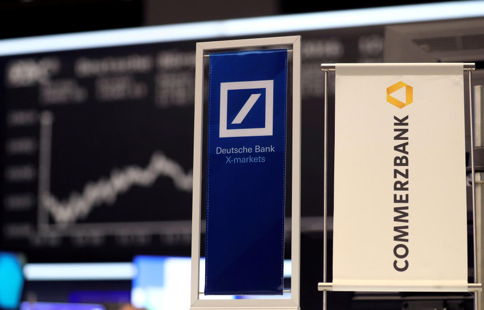 Banners of Deutsche Bank and Commerzbank. Photo: Reuters/Kai Pfaffenbach/File Photo