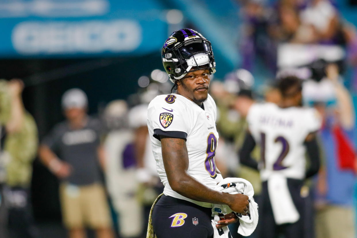 Nov 11, 2021; Miami Gardens, Florida, USA; Baltimore Ravens quarterback Lamar Jackson (8) looks on from the field prior the game against the Miami Dolphins at Hard Rock Stadium. Mandatory Credit: Sam Navarro-USA TODAY Sports