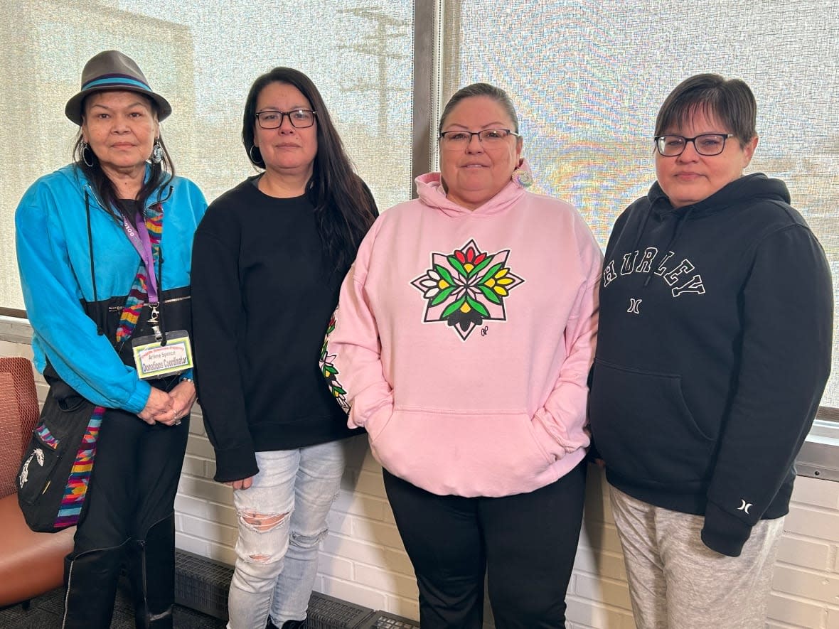 Arlene Spence, left, Amanda Flett, next to her, Lana Sutherland and Melissa Sanderson, right, are among hundreds of Peguis First Nation flood evacuees still unable to return to their homes nine months after flooding forced them out of the community. (Brittany Greenslade/CBC - image credit)