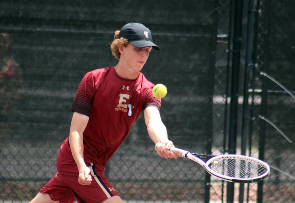 Ford Rachels of Episcopal hits a shot during a boys doubles match in the District 3-1A tournament.