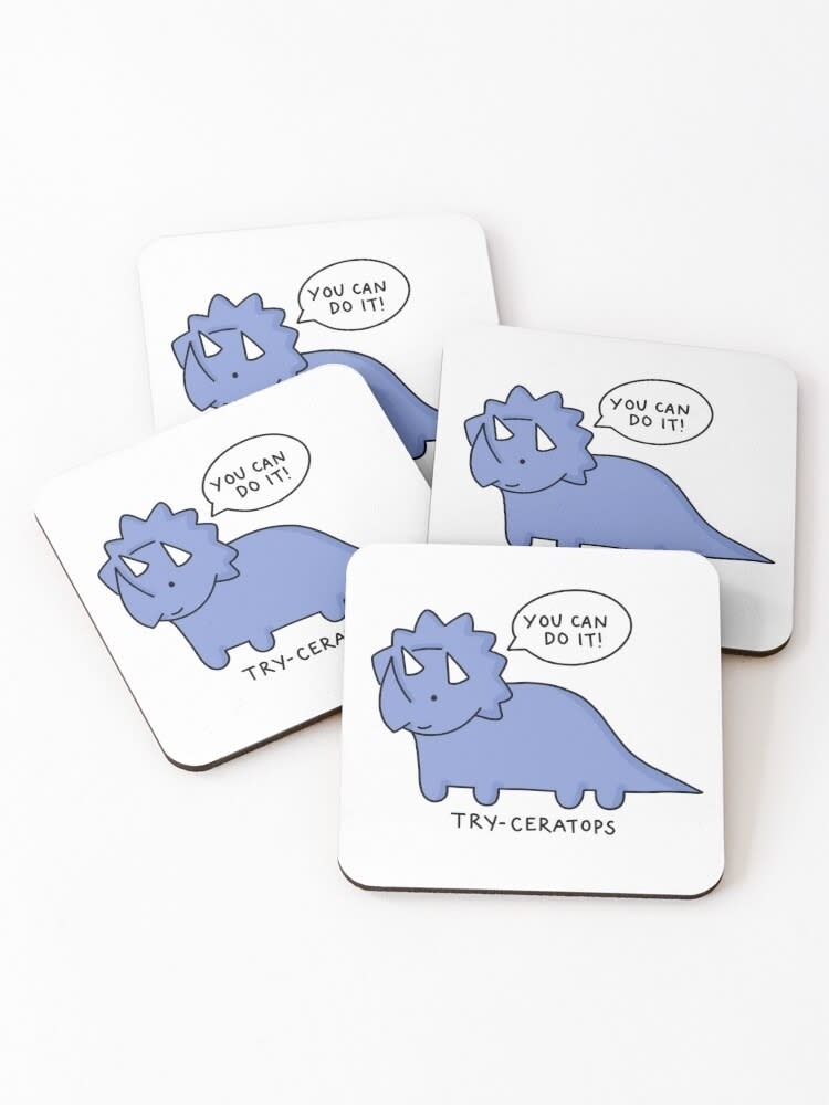 Motivational coasters with cartoon dinosaurs and encouraging phrases like "You can do it!"