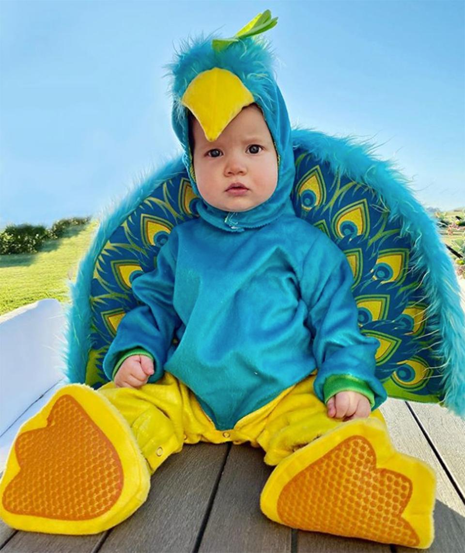 Mommy's little peacock! Birdie was, you guessed it, a bird for her <a href="https://www.instagram.com/p/B4WHUOfAsuQ/" rel="nofollow noopener" target="_blank" data-ylk="slk:first Halloween;elm:context_link;itc:0;sec:content-canvas" class="link ">first Halloween</a>! 