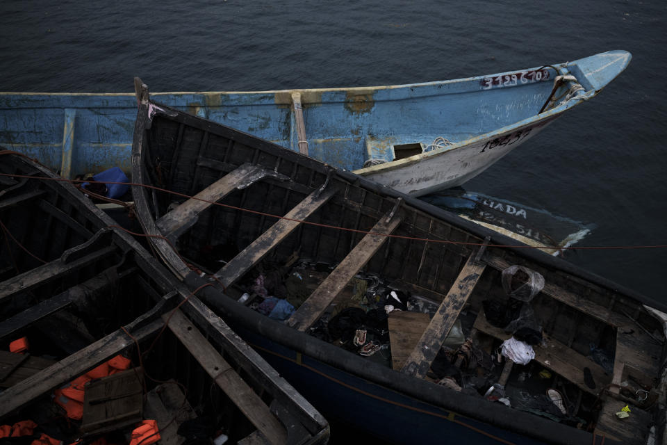 Empty boats used by migrants are moored at the port of Arguineguin in the Canary island of Gran Canaria, Spain, Sunday, Nov. 21, 2021. (AP Photo/Felipe Dana)