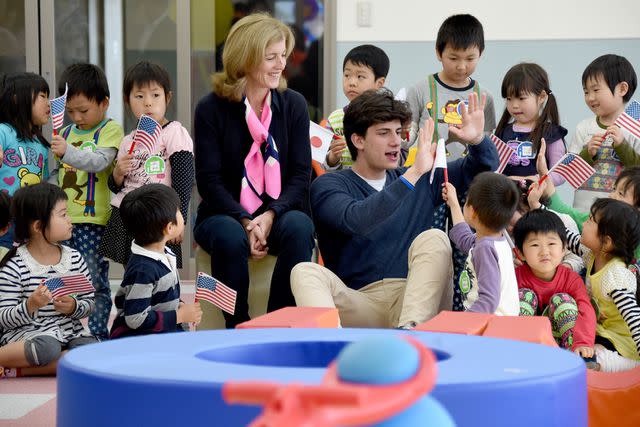 <p>TORU YAMANAKA/AFP via Getty</p> Caroline Kennedy (center left) and John Schlossberg in 2014