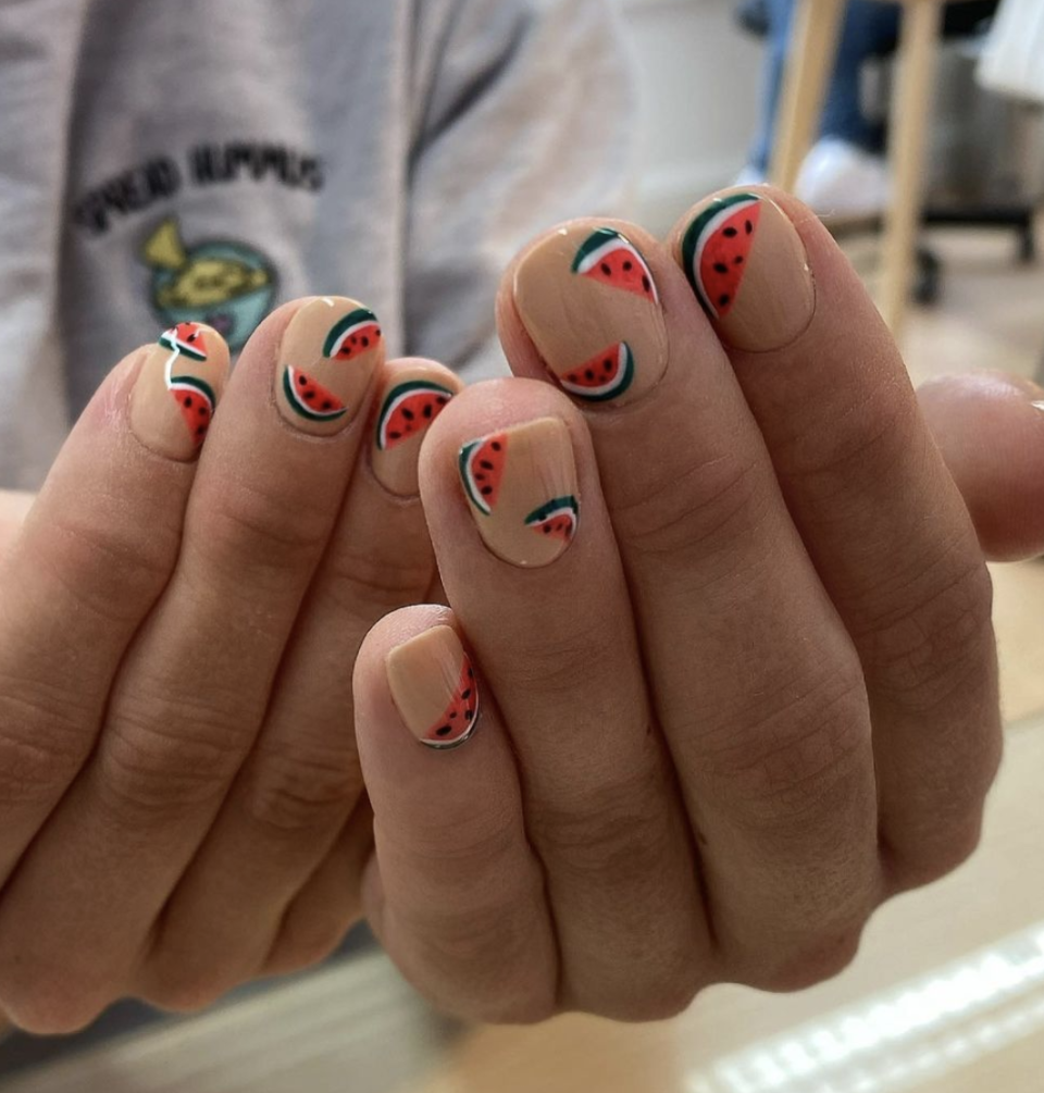 <p>A Fourth of July barbecue wouldn't be complete without a few slices of watermelon to munch on. Add the summery fruit to your nails for a manicure that you can wear on the Fourth and beyond.</p>