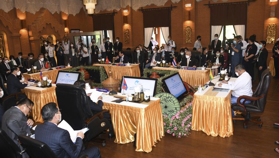 In this image provided by the Myanmar Ministry of Information, foreign ministers from China, Cambodia, Laos, Myanmar, Thailand and Vietnam attend the Lancang-Mekong Cooperation group meeting in Bagan, Myanmar Monday, July 4. 2022. Myanmar’s military government hosted the first high-level regional meeting since the army took power last year with China’s Foreign Minister Wang Yi and counterparts from Mekong Delta nations. (Myanmar Ministry of Information via AP)