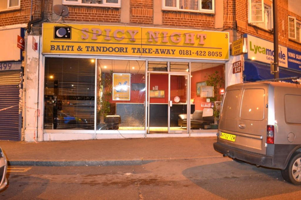 Damage to a window at the Spicy Night takeaway in Alexandra Parade, Harrow (PA Images)