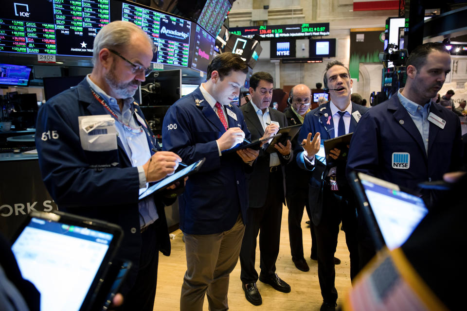 Traders work on the floor of the New York Stock Exchange (NYSE) in New York, U.S., on Friday, May 24, 2019. U.S. equities climbed at the end of a bruising week in which escalating trade tensions dominated markets. Photographer: Michael Nagle/Bloomberg via Getty Images