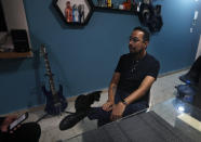 Erik Bravo, 34, a survivor of Monday's subway collapse, speaks during an interview in Mexico City, Thursday, May 6, 2021. Three days after one of the worst accidents of the Mexico City subway system, Bravo says he still cannot process everything that has happened, but repeats that he was one of the lucky ones in a tragedy that left at least 25 dead and more than 70 injured. (AP Photo/Marco Ugarte)